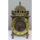 A 17th century style miniature brass bracket clock