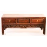 A 19th century Chinese hardwood low table.
