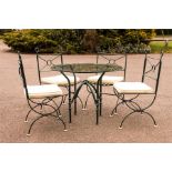 A set of four green painted iron conservatory chai