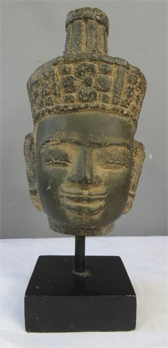 A Thai head on stand.