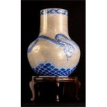 A fine Japanese vase, with ovoid body, depicting s