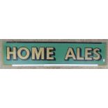 A Home Ales plastic pub advertising sign.