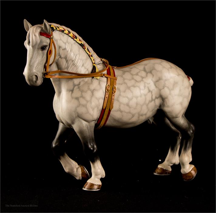 A Beswick dapple grey horse with plaited maine.