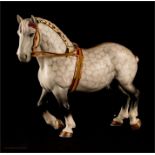 A Beswick dapple grey horse with plaited maine.