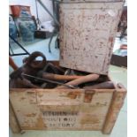 A wooden box of tools including vices, files spann