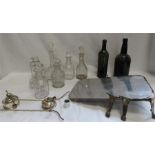 A group of cut glass decanters, two vintage bottle