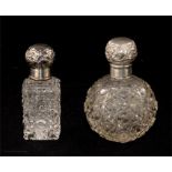 A Mappin & Webb cut glass silver top scent bottle,