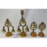 Four brass swingers in the form of bells and a gon