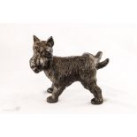 A comical Scottie dog iron doorstop.