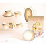 A Clarice Cliff part coffee set, composing teapot, cream jug, four cups and saucers, numbered to