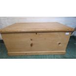 A pine blanket chest with carrying handles, 38 by 84 by 47cm.