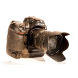 Nikon D2HS camera body with NIKON zoom lens: AF-S Nikkor 18-200 1:3.5-5.6 G ED and HB35 hood