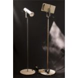 Two Rotaflex floor standing modernist lamps on white circular bases, approximately 115cm tall.