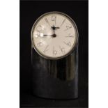 A Tantalo clock in chrome by Richard Sapper 1971.