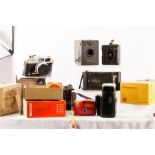 A quantity of vintage cameras and photography accessories.