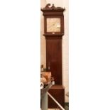 A Wilson of Stamford mahogany cased longcase clock with painted dial, Roman numerals. 217cm high.