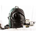 Lowepro Photo trekker classic backpack with various items of photography equipment to include