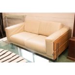 A Habitat cream leather sofa on English oak frame with slender chrome square section legs 160cm long