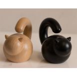 Two Aarikka models of cats in ebony and ash, 6½cm high.