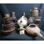 A Japanese FF Lipservice teapot, Arabia stoneware tea and breakfast ware and two terracotta