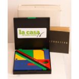 A Palettacom La Casa de Marie-Claire desk set in brightly coloured plastic in black fold-over case.