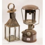 Colemans paraffin camping lamp and a metal cased candle lantern.