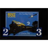 A rectangular metal advertising sign for Bassett Howke, model makers 23 by 31cm, plus two small