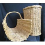 A wicker log carrier and wicker linen basket.