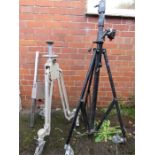 Two large photography tripods, including a Linhoff.