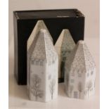 A Rosenthal salt and pepper pot in the form of castles, boxed.