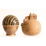 An ovoid pottery trinket box by J Young and stoneware model of cottages on a hill.