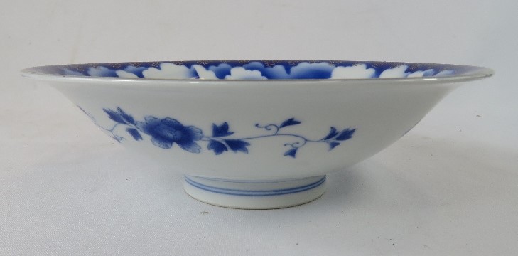 A Japanese Fukagawa porcelain dish with original label and character mark, blue and white. - Image 2 of 3