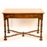 An early 19th century table with wavy stretcher and single drawer.