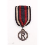 A Queen Alexandra's Imperial Military Nursing Service Reserve medal.