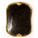 A fine and large black laquered tray with gilt decoration to the rim, 76 by 57cm.
