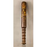 A Stamford 19th century policeman's truncheon with crest and Stamford hand painted and gilded.