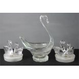 A pair of Royal Crystal Rock Swan models, together with a glass bowl in the form of a swan. (3)