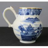An early 19th century blue and white sparrow beak jug, a blue and white Chinese tea bowl and bud