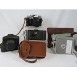 A 1950s Czech made 1935 camera together with a Zenith EM N75083671 and Bessa Yagelander camera