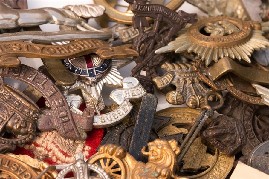 A group of military cap badges. - Image 3 of 3