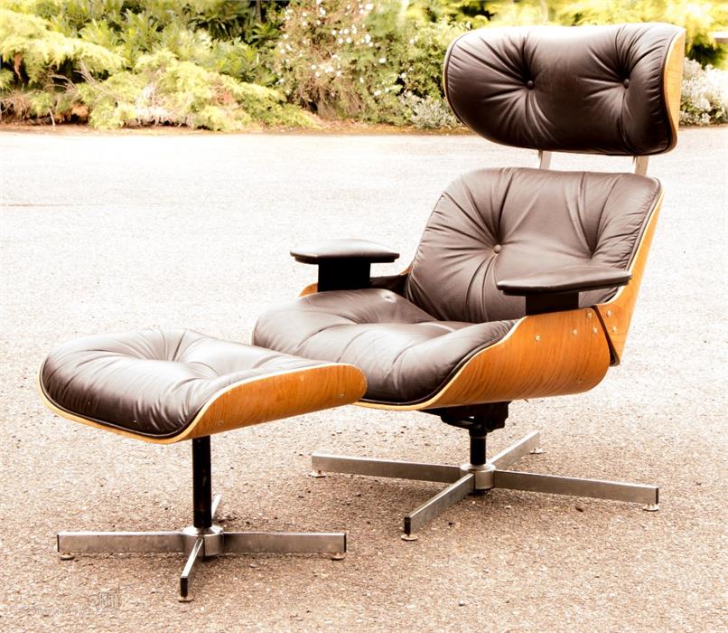 An Eames style chair and ottoman.