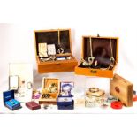 A quantity of costume jewellery to include two jewellery boxes containing brooches, necklaces