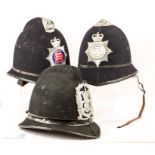 Three police helmets.