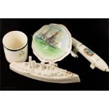 WWI crested china cups, torpedo and battle shop, and Sherwood Foresters Mess cup.
