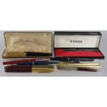 A group of pens to include a Parker pencil, fountain pen in box, and various other pens and Parker