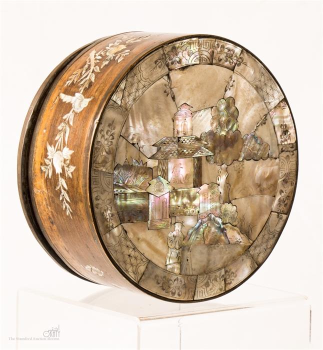 A mother of pearl Chinese box and cover depicting a figural scene.