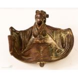 Erotica: a bronze dish in the form of a Geisha girl, with bare bottom underside, with residual