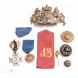 A group of WWI Imperial German badges and insignia.