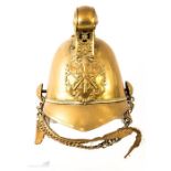 A brass Firemans helmet, early 20th century.