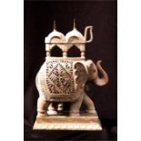A large soapstone carved candle holder, in the form of an elephant.